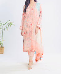 Model wearing Nureh SP-114 Signature Lawn 3-Piece Stitched Suit in soft peach with delicate printed embroidery and chiffon dupatta β Marina Mystique summer collection.