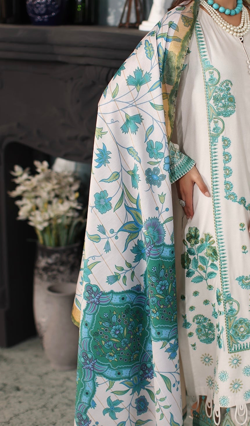 Charizma Poshima Printed wool shawl with teal floral design complementing the Dhank embroidered leather suit from Marina Mystique.
