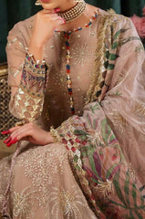 Close-up of neckline and sleeve embroidery on Aroha Luxury Formal 04 with organza detailing.