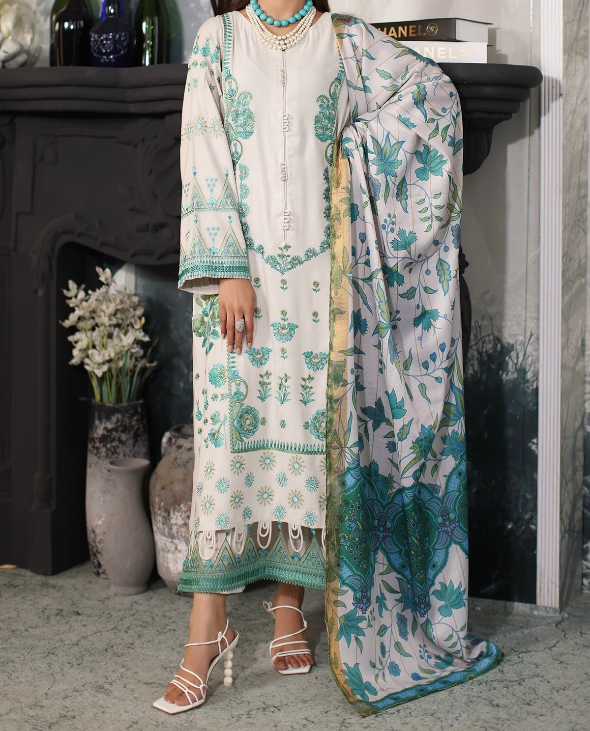 Charizma-Full 3-piece stitched Dhank front embroidered suit displayed on model – luxury winter wear by Marina Mystique.