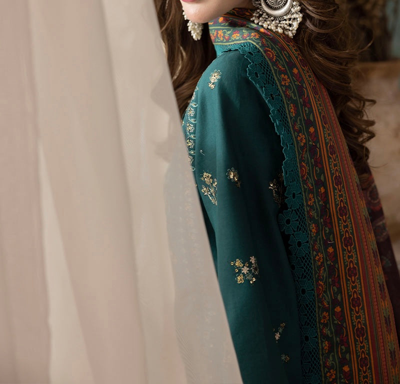 Side pose of emerald green embroidered 3-piece outfit – Marina Mystique