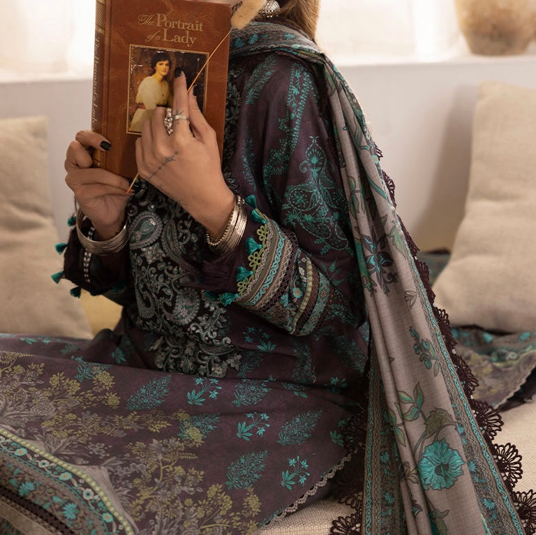 Close-up of sleeve embroidery and lace detailing on emerald green cambric