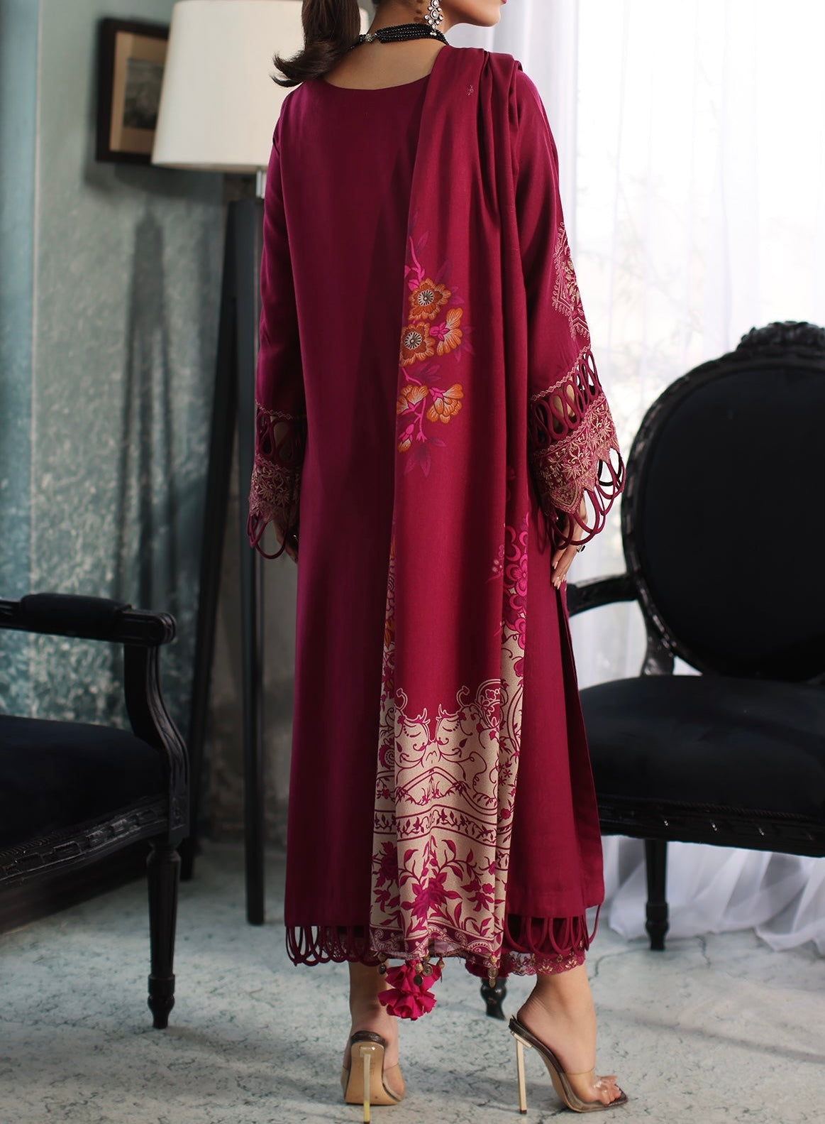 Complete back look of maroon embroidered leather outfit styled with printed wool shawl-posima-marina mystique