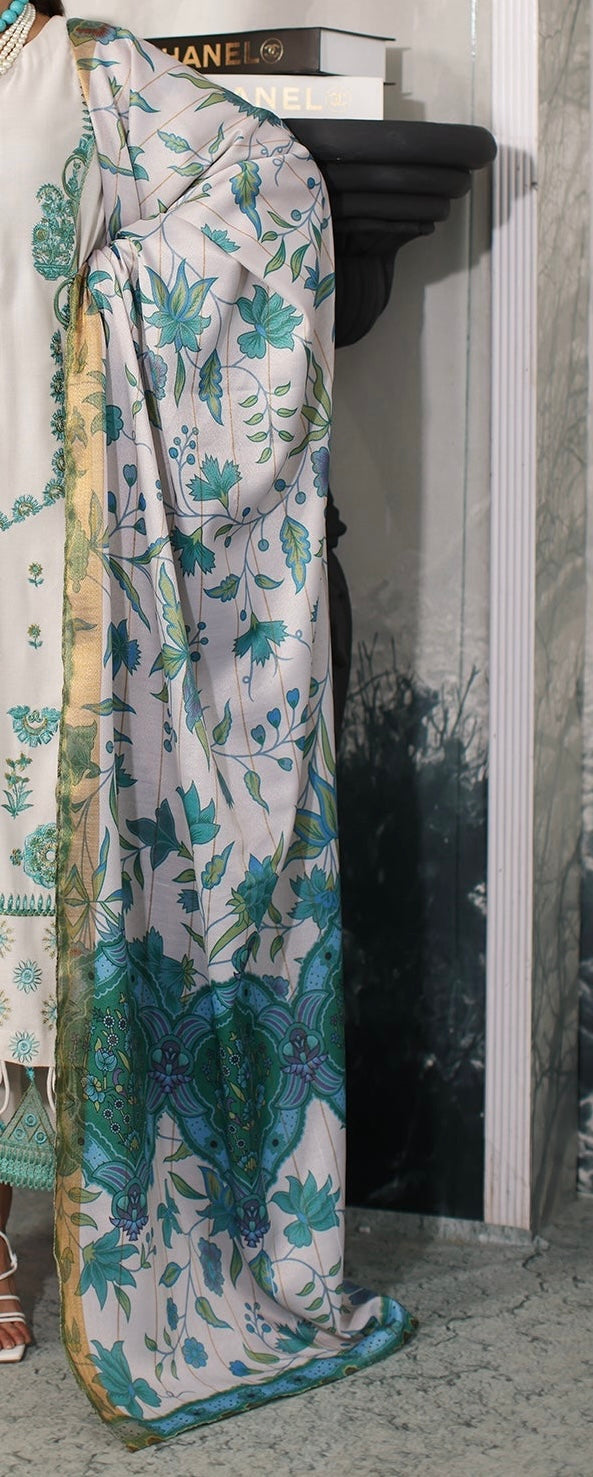 Charizma Printed wool shawl with teal floral design complementing the Dhank embroidered leather suit from Marina Mystique.