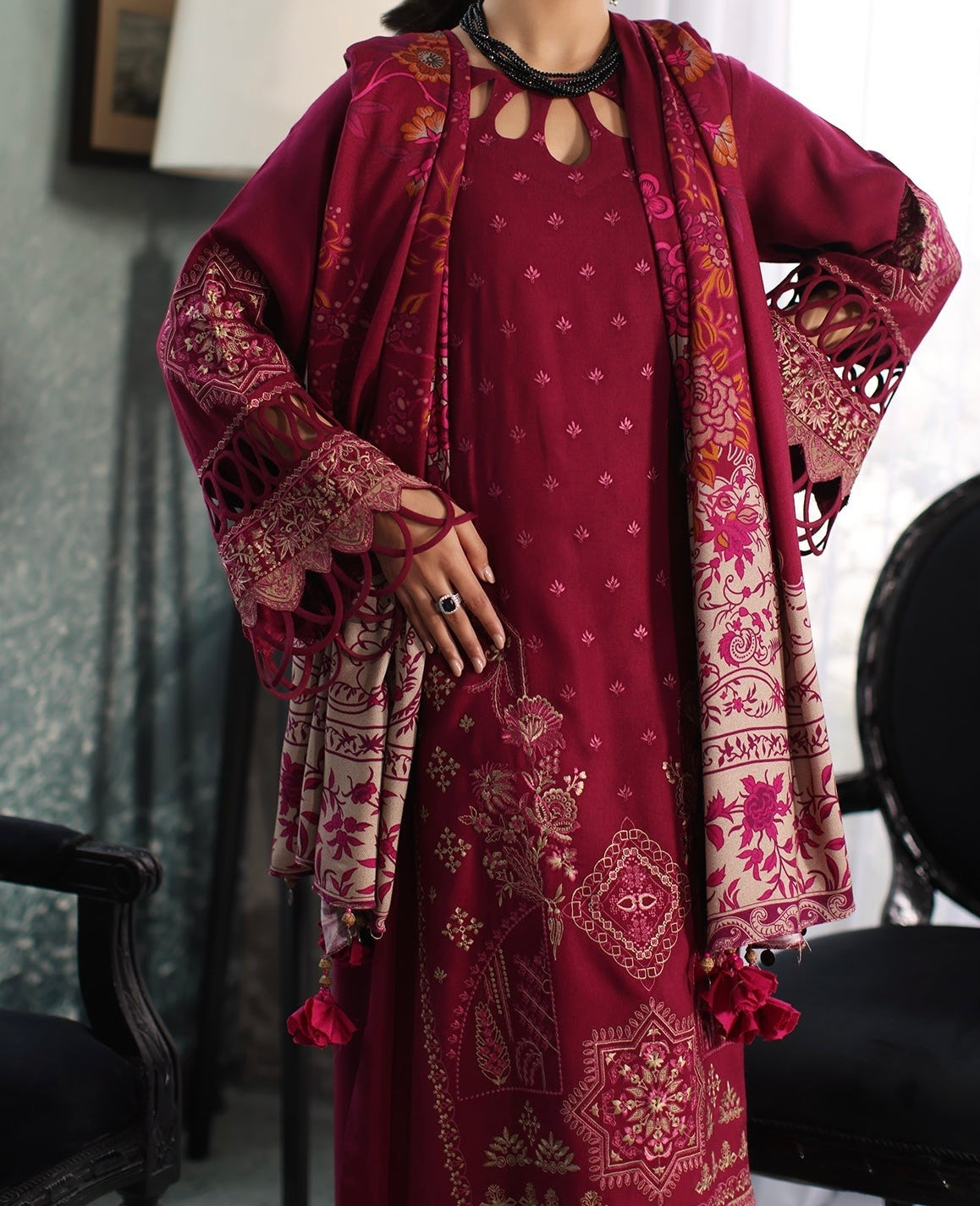 Complete look of maroon embroidered leather outfit styled with printed wool shawl