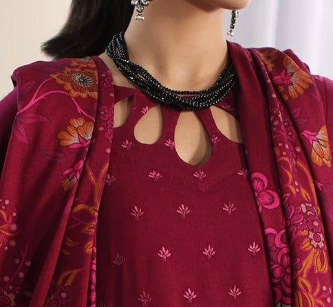 Close-up of detailed embroidery on maroon leather shirt  neck design– poshima Marina Mystique Party Wear