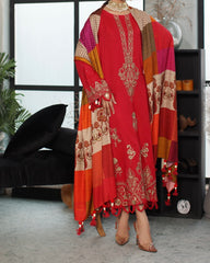 Front view of red embroidered leather 3-piece suit with printed wool shawl – Marina Mystique Winter Collection