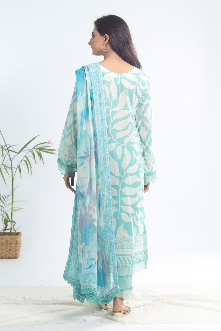 Back design of Nureh SP-115 Signature Printed Lawn shirt in soft sea-green with delicate signature print detailing – stitched suit by Marina Mystique.