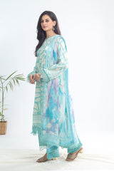 Side view of Nureh SP-115 Signature Lawn suit showing printed sea-green shirt with chiffon dupatta – breathable premium lawn outfit for summer wear.