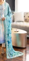 Chiffon dupatta in turquoise, aqua, and white polka dots paired with embroidered Nureh Signature Lawn suit – light summer pastel design.