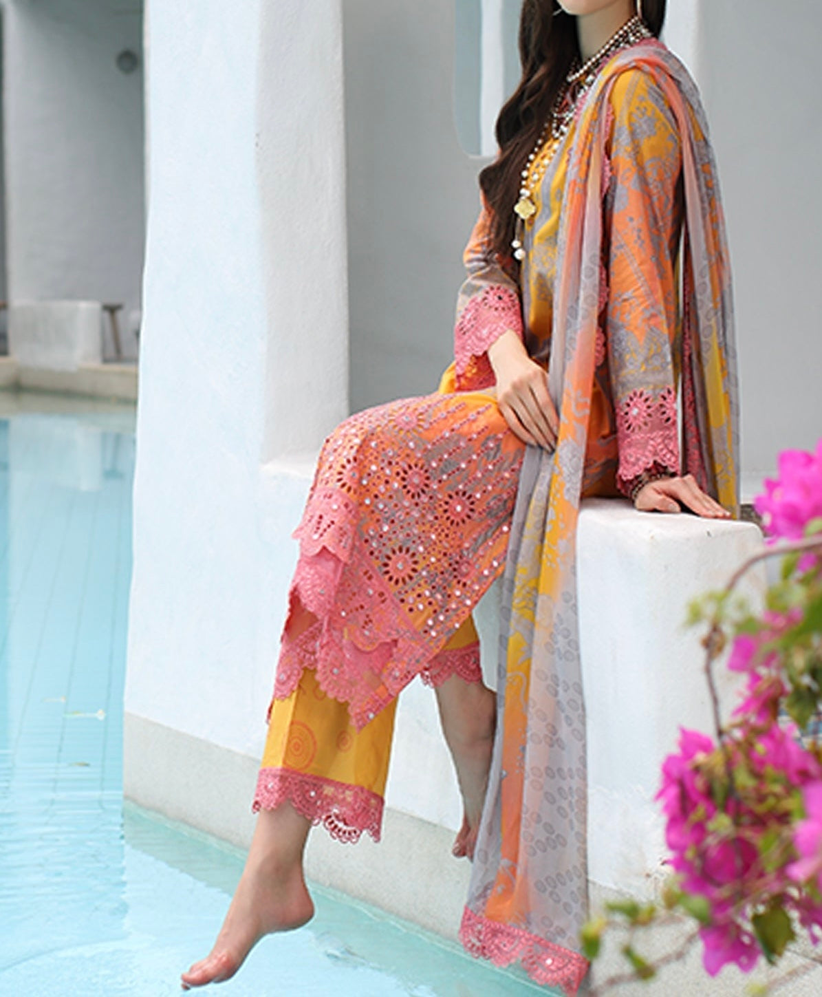 Side view of the embroidered lawn shirt showing sleeves patti and ombre dupatta.