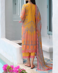 Back view of the printed orange pink lawn shirt paired with matching trousers.